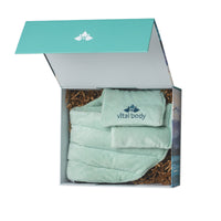 Vital Body hot pack folded in an open box on a white background