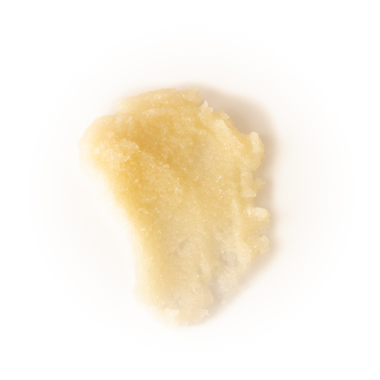 Close-up of body scrub on a white background