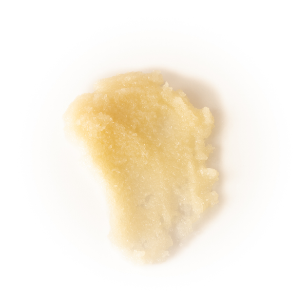 Close-up of body scrub on a white background