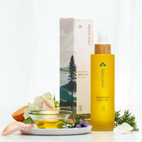 Vital Body Radiance Body Oil with packaging and ingredients on a white background
